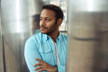 Close up photo of man looking away at work