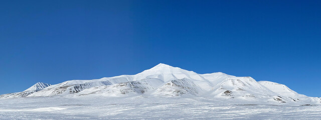snow covered mountains - 597147617