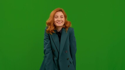 Female covers her mouth with her hand and whispers secret on green screen background. Body language gesture showed on camera. Symbols concept.