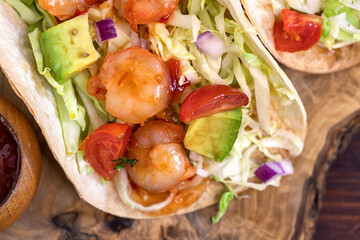 Homemade shrimp tacos with avocado salad  - 597156419