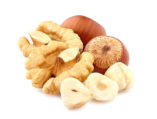 Hazelnuts with walnuts  in closeup isolated on white background. Nuts closeup.