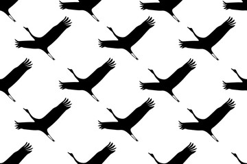 Obraz premium Seamless pattern with Black Birds silhouette on white background. Crane Wedge. Flock of Storks. Victory Day concept. Wallpaper and bed linen print. Vector illustration.