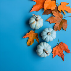 Pumpkins and autumn leaves on a blue background. Generative AI