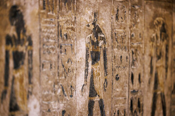 Ancient Egyptian hieroglyphs engraved in stone - Cairo
