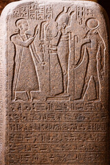 Ancient Egyptian hieroglyphs engraved in stone - Cairo