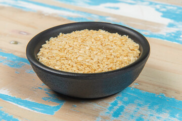 bowl with chickpea on blue rustic wooden table