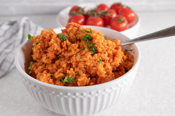 Tomato brown rice in a bowl for healthy and gluten free side dish