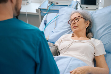 Elderly patient undergoes examination and treatment in the cardiology department