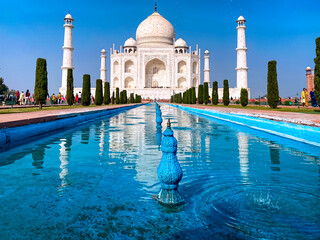 Naklejka premium Agra, Uttar Pradesh, India - 12.15.2022: Taj Mahal, Agra, India. Tourists visiting a popular tourist attraction.