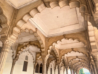 The famous red fort in the city of Agra, India. Tourists visit a popular tourist attraction.