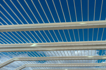 Fototapeta premium Steel roof with blue sky