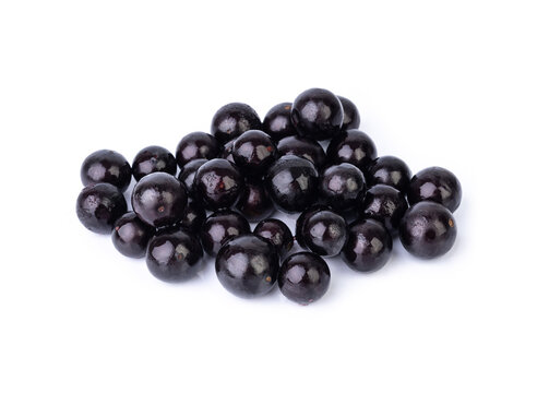 A group of jabuticabas isolated over white background