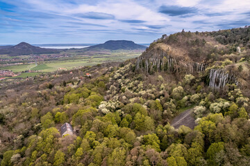 Fototapeta na wymiar Szent György Mountain's basalt organs with the surrounding volcanic mountains in the Balaton Uplands of Hungary during spring 