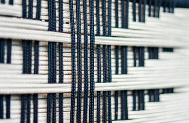 The art of woven cotton ropes is used to make furniture and chairs. Forming an interesting pattern, good for use as a background design or pattern.