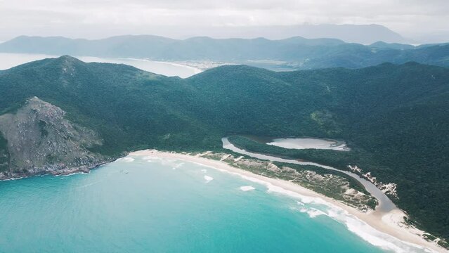 Aerial view of the sandy beach in Brazil. Lagoinha do leste beach and lagoon on the south of Brazil