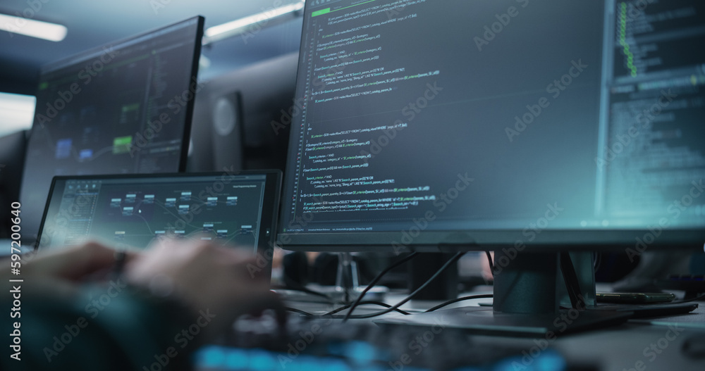 Fototapete Close Up of a Software Developer Working on a Desktop Computer, Programming Code Running on Display. Specialist Typing on Keyboard, Coding and Implementing a Technical Feature