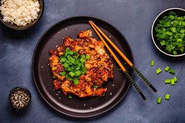 Fried kimchi with pork onions and spices. Traditional Korean food