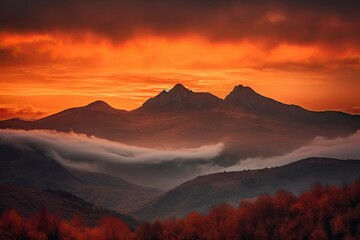 majestic mountain range in fiery sunset with clouds and mist, created with generative ai