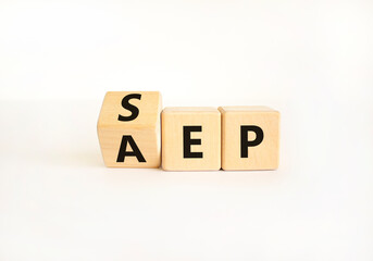 SEP or AEP symbol. Concept words AEP annual enrollment period SEP special enrollment period. Beautiful white table white background. Medical annual or special enrollment period concept. Copy space.