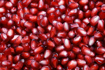 red pomegranate seeds texture, top view