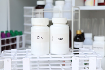 Zinc pill in white bottle, pill stock