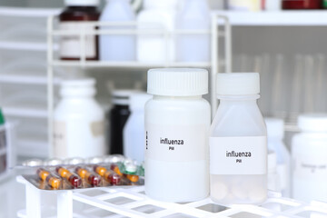 influenza pill in white bottle, pill stock