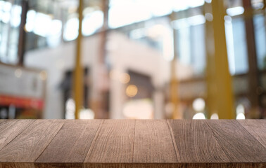 Empty dark wooden table in front of abstract blurred bokeh background of restaurant . can be used for display or montage your products.Mock up for space.