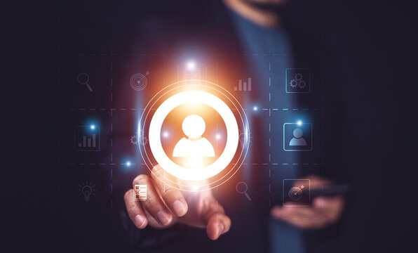 Businesspeople touching on screen to target customer. Target customer, buyer persona, customer behavior concept. Marketing plan and strategies. Personalization marketing, customer centric strategies.