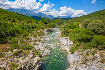 Fototapeta na wymiar The Cavu river and its natural pools. Piscines Naturelles De Cavu are natural swimming pools formed by river Cavu, Corse du Sud, Corsica, France