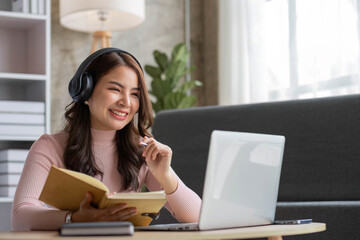 Asian girl student online learning class study online video call zoom teacher, Happy asian girl learn english language online with computer laptop.. © wichayada