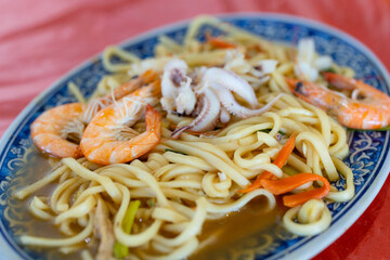 Seafood fry noodles with shrimp and squid