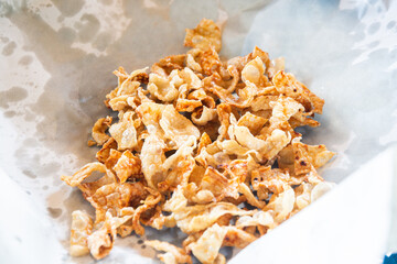 crispy chicken skin on paper