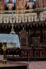 Magnificent opulent splendid baroque gothic church cathedral basilica interiors with stucco, murals, altar, Pilars, ceiling paintings, gold, wood domes nave