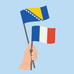 Flags of Bosnia and Herzegovina and France, Hand Holding flags
