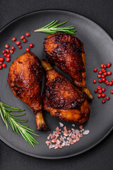 Delicious grilled chicken legs with spices and herbs in teriyaki sauce