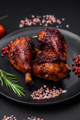 Delicious grilled chicken legs with spices and herbs in teriyaki sauce