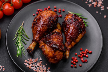 Delicious grilled chicken legs with spices and herbs in teriyaki sauce