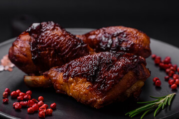 Delicious grilled chicken legs with spices and herbs in teriyaki sauce