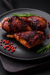 Delicious grilled chicken legs with spices and herbs in teriyaki sauce