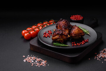 Delicious grilled chicken legs with spices and herbs in teriyaki sauce