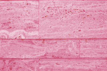 Background of ceramic tiles in new trendy color of 2023 Viva Magenta. Monochrome. Abstract....
