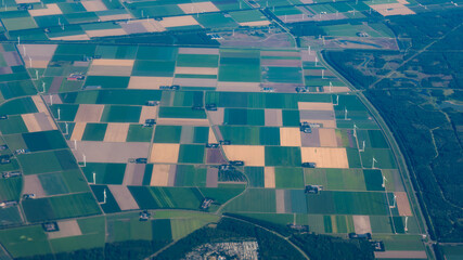aerial view of the agricultural fields. Windmills in the fields. farmland of the Netherlands