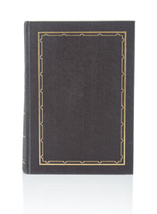 Fototapeta premium Book with hard brown cover close up on a white background