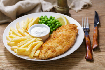 plate of fish and chips with french fries