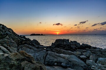 sunset over the sea off the coast of sardinia