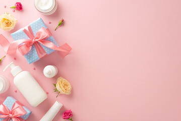 Elegant natural skincare concept with a top view flat lay of beautiful cream bottles, tubes, pump bottles, gifts and pipettes with stunning rose flowers on a pastel pink background with blank space
