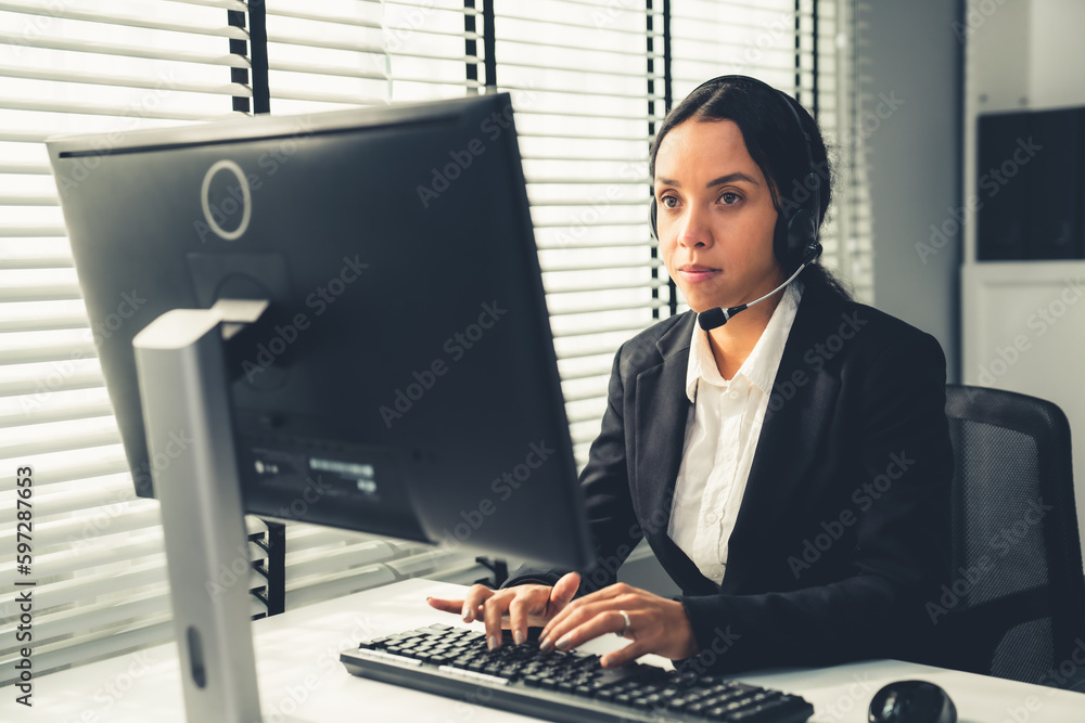 Aufkleber competent female operator working on computer and talking with clients. concept relevant to both cal