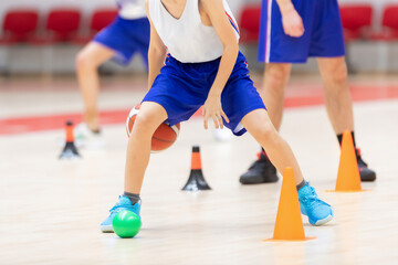 Kid basketball training. Boys practicing basketball on training session. Horizontal sport theme poster, greeting cards, headers, website and app