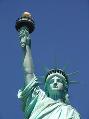 Fototapeta premium Statue of liberty on a sunny day NYC