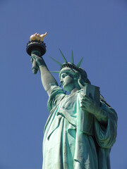 Fototapeta premium Statue of liberty on a sunny day NYC
